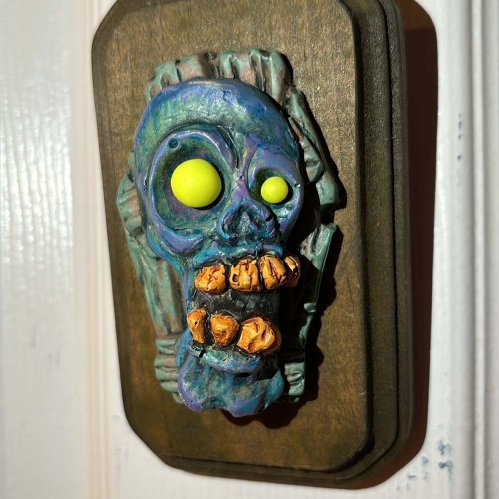 Handmade Coffin Zombie Head wall decor with glow in the dark eyes